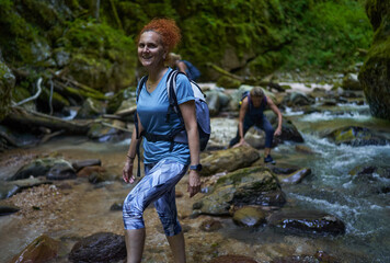 Woman hikers exploring a gorge