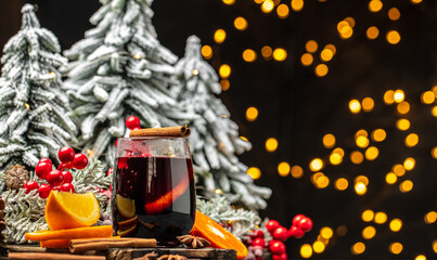 glasses of mulled wine, Christmas winter alcohol drinks decorated by christmas lights