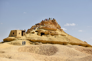 the mountain of the dead at siwa oasis egypt on sunny day - obrazy, fototapety, plakaty