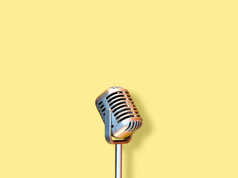 retro condenser microphone, isolated on yellow