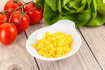 Shredded cheese in the bowl