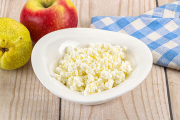 Organic cottage cheese in the bowl