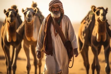 Foto op Plexiglas old age man walking with camels in the desert. © PIX OF WORLD AI