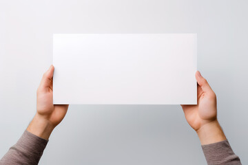 Obraz premium Hands holding a sign mockup for text, white background.