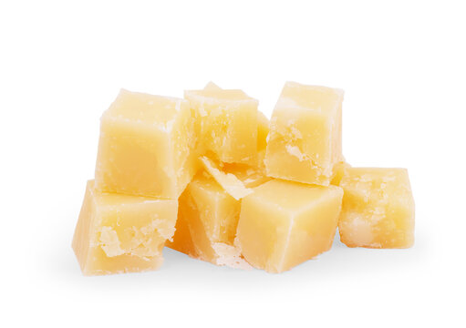 Swiss cheese cubes on white background