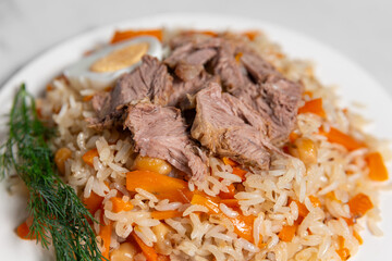 Oriental pilaf, Asian plov, rice with beef