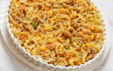 Creamy Corn Casserole with Sausage in baking dish