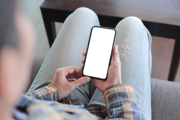 cell phone blank white screen mockup.hand holding texting using mobile on desk at office.background empty space for advertise.work people contact marketing business,technology