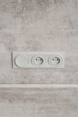 European electrical socket with light switch.