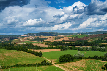 Fototapeta na wymiar Rural landscape in Val d Orcia, Tuscany, at summer