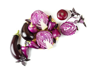 Composition of fresh vegetables eggplants, cabbage, pepper, onion and basil leaves of on white background. Creative food concept. Flat lay, top view.