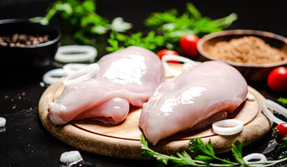 Fresh chicken fillet with spices.