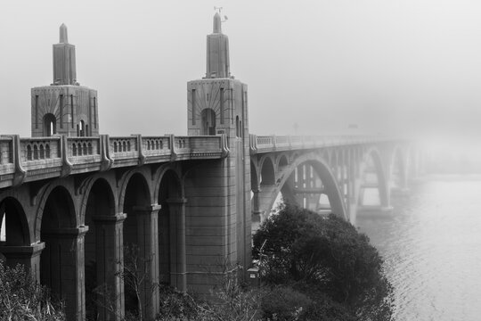 Isaac Lee Patterson Bridge Over The Rogue River At Gold Beach Oregon On A Very Foggy Day.