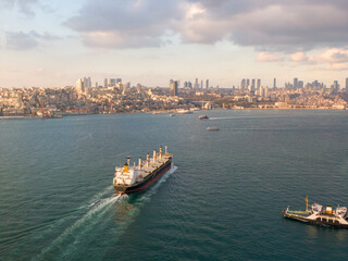 Aerial view of freight ship with cargo containers.