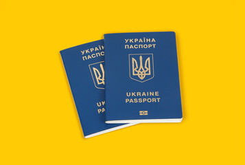 Foreign passport of Ukraine on yellow background