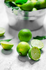 Fresh limes. On white table.