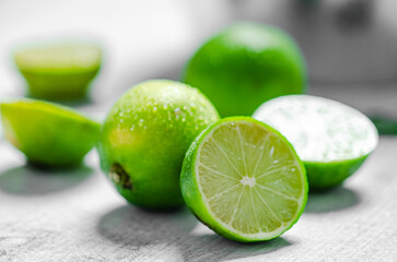 Fresh limes. On white table.