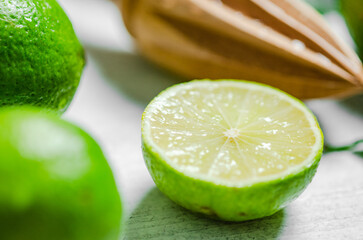 Fresh limes. On white table.