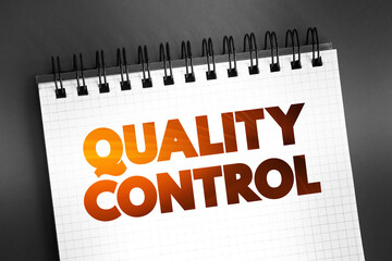 Fototapeta premium Quality Control text on notepad, concept background