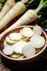 Fototapeta premium Chopped parsley root. On table