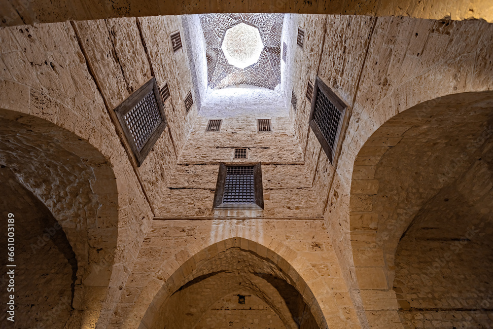 Wall mural architecture details of the mosque in citadel of qaitbay building ancient fort at mediterranean sea 