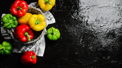 Fresh sweet pepper. On black table.