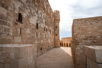 Citadel of Qaitbay building ancient fort at Mediterranean sea coast, in Alexandria, Egypt