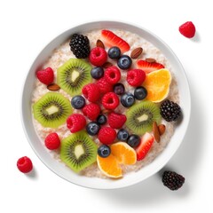 Top view of a fresh, delicious, wholesome and nutritious breakfast porridge with fruits and berries, beautifully decorated, food photography