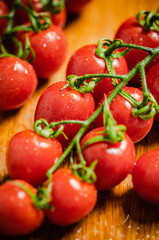 Fresh tomatoes. On wooden table.