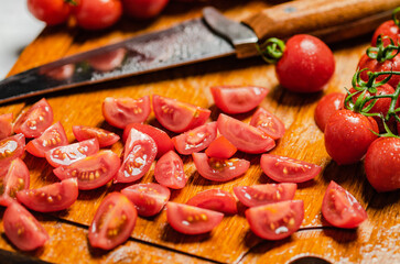 Fresh chopped tomatoes. On cutting board.