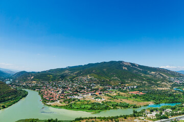 Panoramic beautiful aerial view of Mtskheta town with the rivers Kura and Aragvi in Georgia
