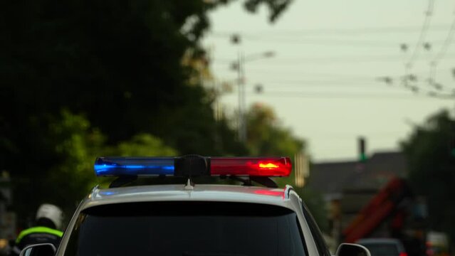 Police car with beacon red and blue light flashing in mission. 4k video with police motorcade.4k, 4k video, accident, alarm, arrest, auto, beacon, blinker, blue, car, city, control, cop, crime, crime 