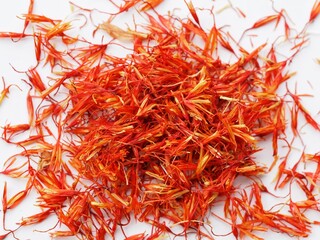 Fototapeta premium dried saffron threads on a white background 