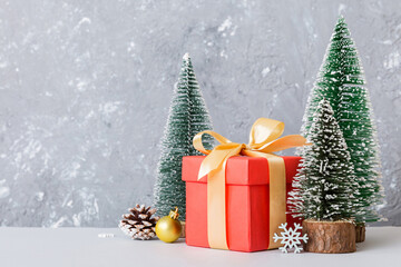 Christmas composition. craft Gift box, small tree, branches and craft DIY decorations on white background. New year concept. Christmas home decoration Flat lay, top view, copy space