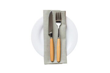 isolated christmas Plate with decor and fork and spoon. New year holiday background. Top view