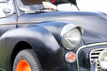 part of old black car at the exhibition