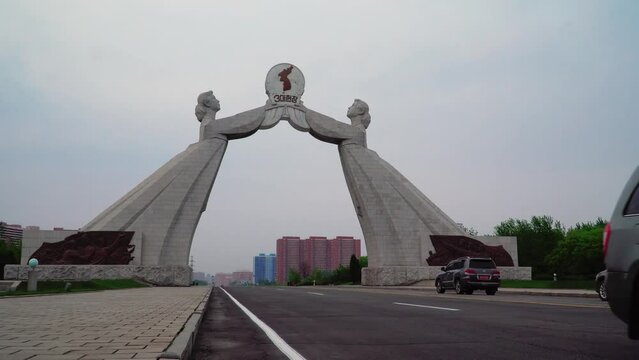 Pyongyang, North Korea, view of a road leading into the city, Reunification Arch