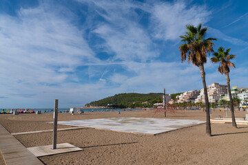 Oropesa del Mar beach with palm trees Costa del Azahar, Spain between Benicassim and Marina D`or