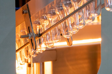 The drinking water bottle manufacturing process by blow mold machine.