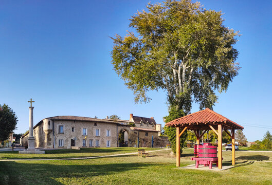 View of entrance of castle of Chonas-l'Amballan and historic wine press, Isere, France