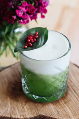 Basil Smash cocktail in a restaurant
