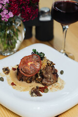 Pork tenderloin showcased on a restaurant plate
