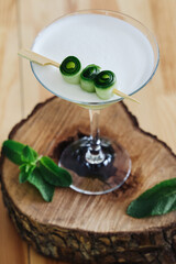 A visually stunning Gin Garden cocktail, captured in a close-up view
