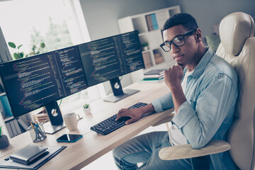 Photo of young man server moderator working at home office typing keyboard touch chin thinking to improve his programming skill indoors - obrazy, fototapety, plakaty