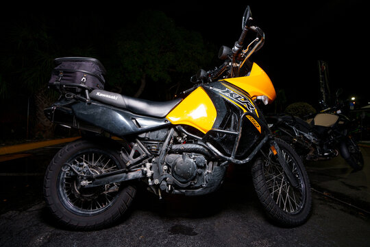 Night photo of a Kawasaki KLR 650 dual sport motorcycle