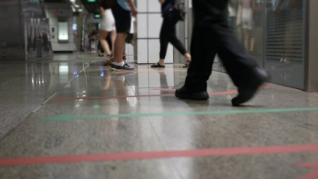landscape view interior at subway mrt underground station of Singapore with crowded passenger after getting of the train in rush hour,Commuters in MRT Subway of Singapore