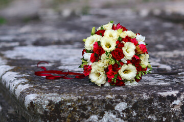 beautiful wedding bouquet on stone