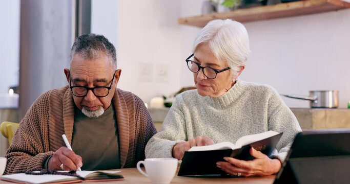 Writing, old couple and bible in home for faith, religion or God with notes for worship in notebook. Studying Jesus Christ, holy books or Christian people learning literature or spiritual prayer