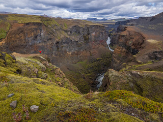 Hiker in Markarfljótsgljúfur canyon