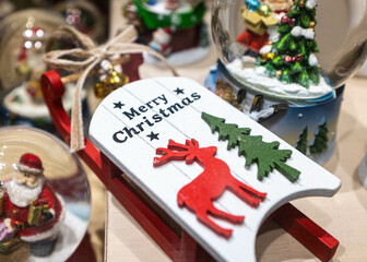 Close up Christmas decorations in a shop window in Lviv, Ukraine. Blur and selective focus